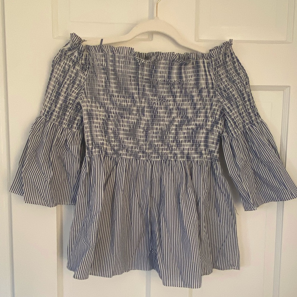 Babydoll striped blouse! This cute little number can be shown on a breezy day!